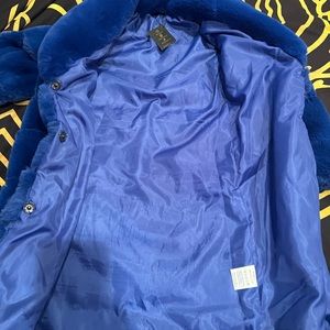 Little girls blue fur coat.